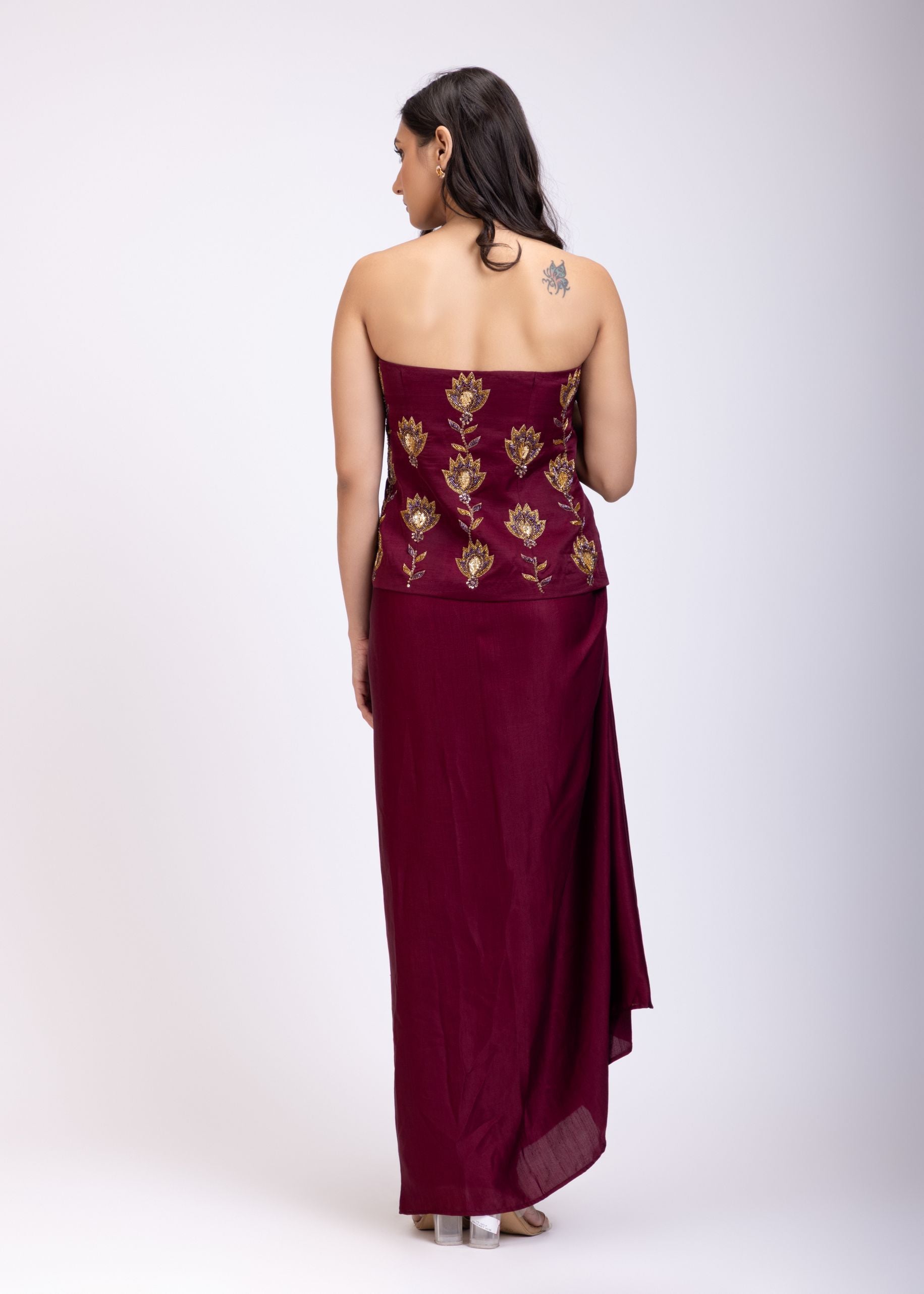 Maroon Off Shoulder Corset top with Gold Cutdana Detailing and Drape Skirt back