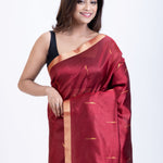 Maroon Traditional Silk Saree with Black Floral Pallu Close Up
