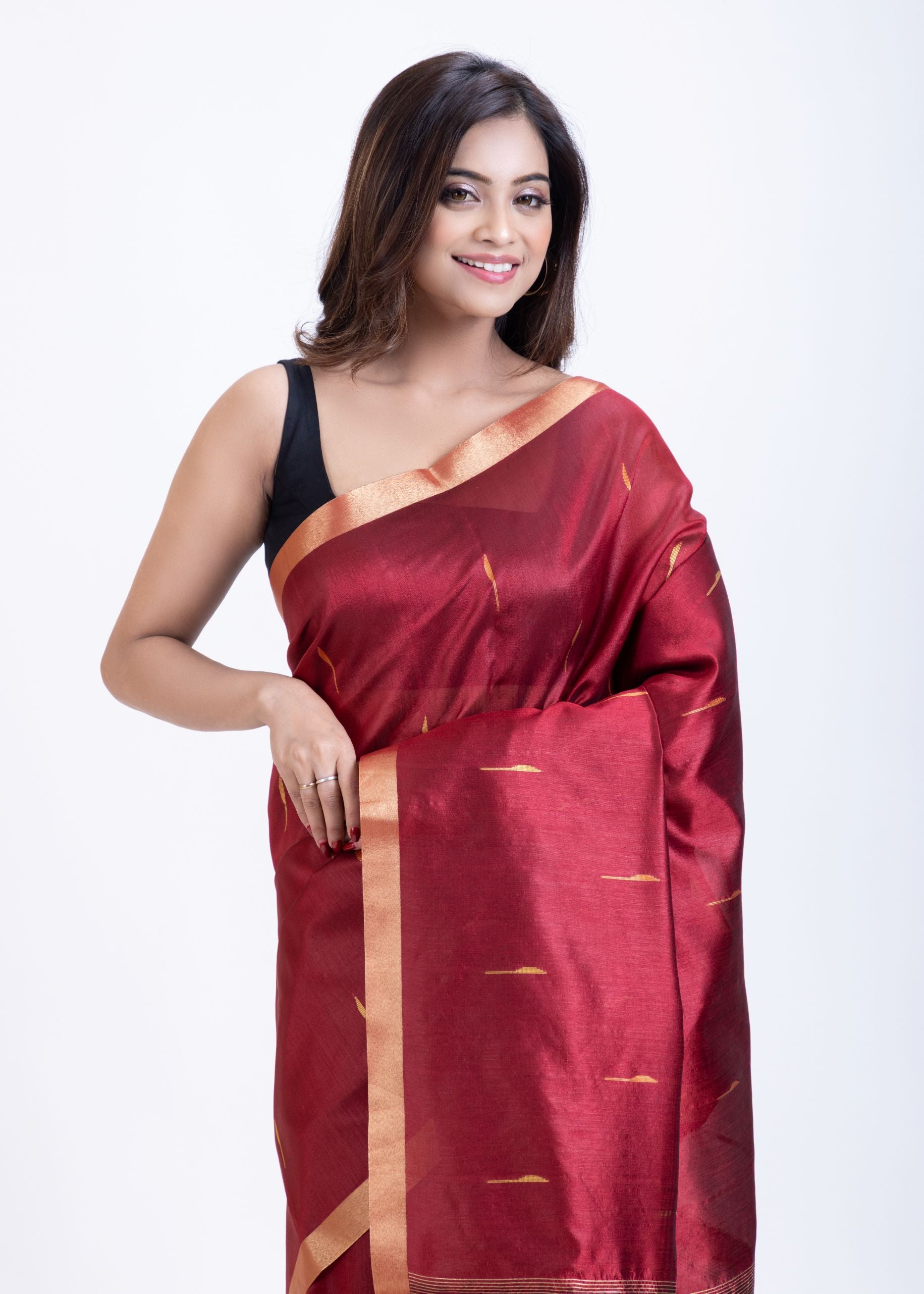 Maroon Traditional Silk Saree with Black Floral Pallu Close Up
