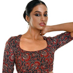 Close-up of handcrafted maroon and black Ajrakh print pure cotton saree blouse with ethnic design