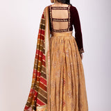 Mustard Yellow Lehenga Set With Marron Velvet Choli back