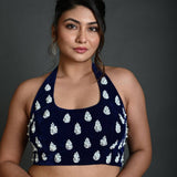 Navy blue velvet halter neck saree blouse with hand embroidery — front view — Anvi Couture