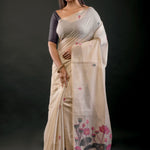 Off White Cotton Jamdani Saree With Floral Woven Work Front
