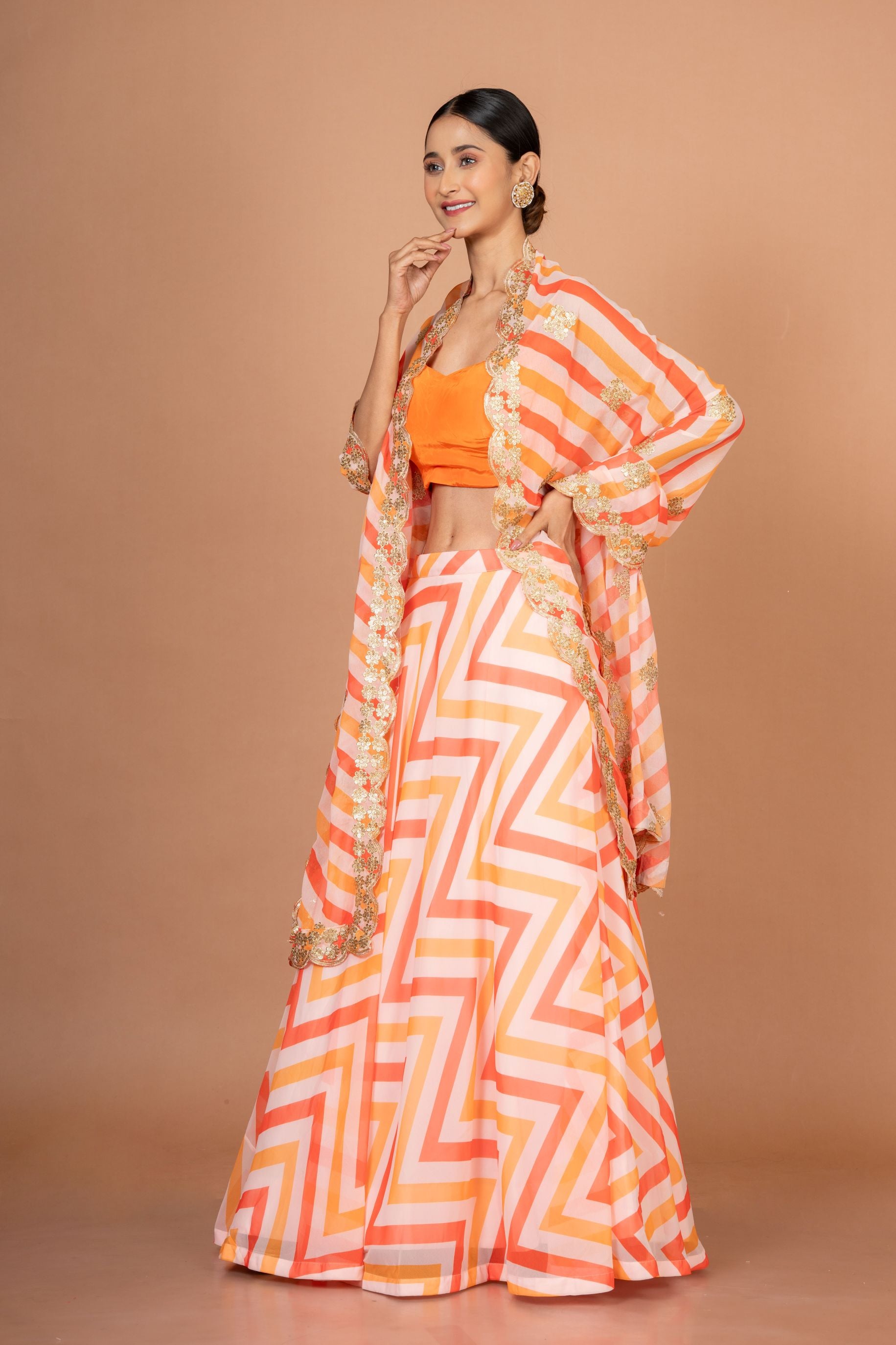Orange Lehenriya Embroidered Georgette Lehenga Side
