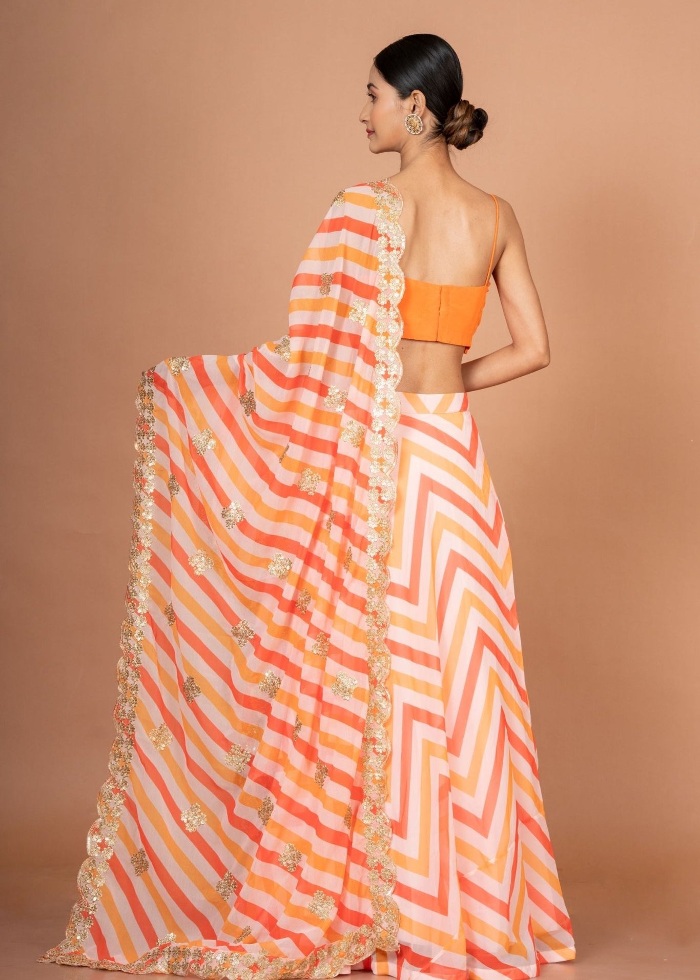 Orange Lehenriya Embroidered Georgette Lehenga - Anvi Couture