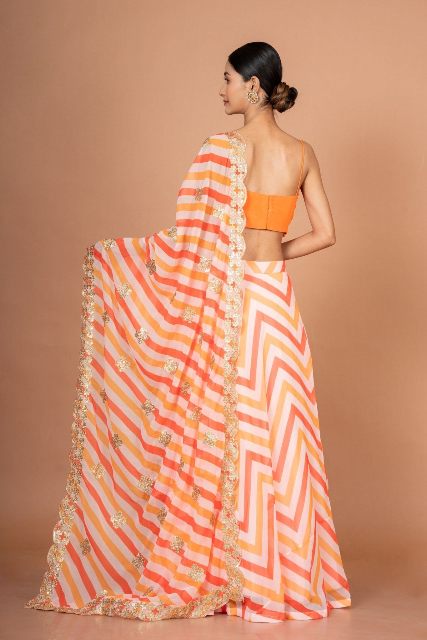 Orange Lehenriya Embroidered Georgette Lehenga - Anvi Couture