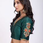 Orange and Green Raw silk Embroidered Lehenga Set close up