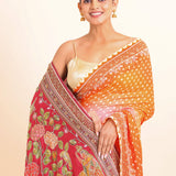 Orange and Red Bandhani Saree with Kalamkari Pallu with Hand Embroidered Work close up