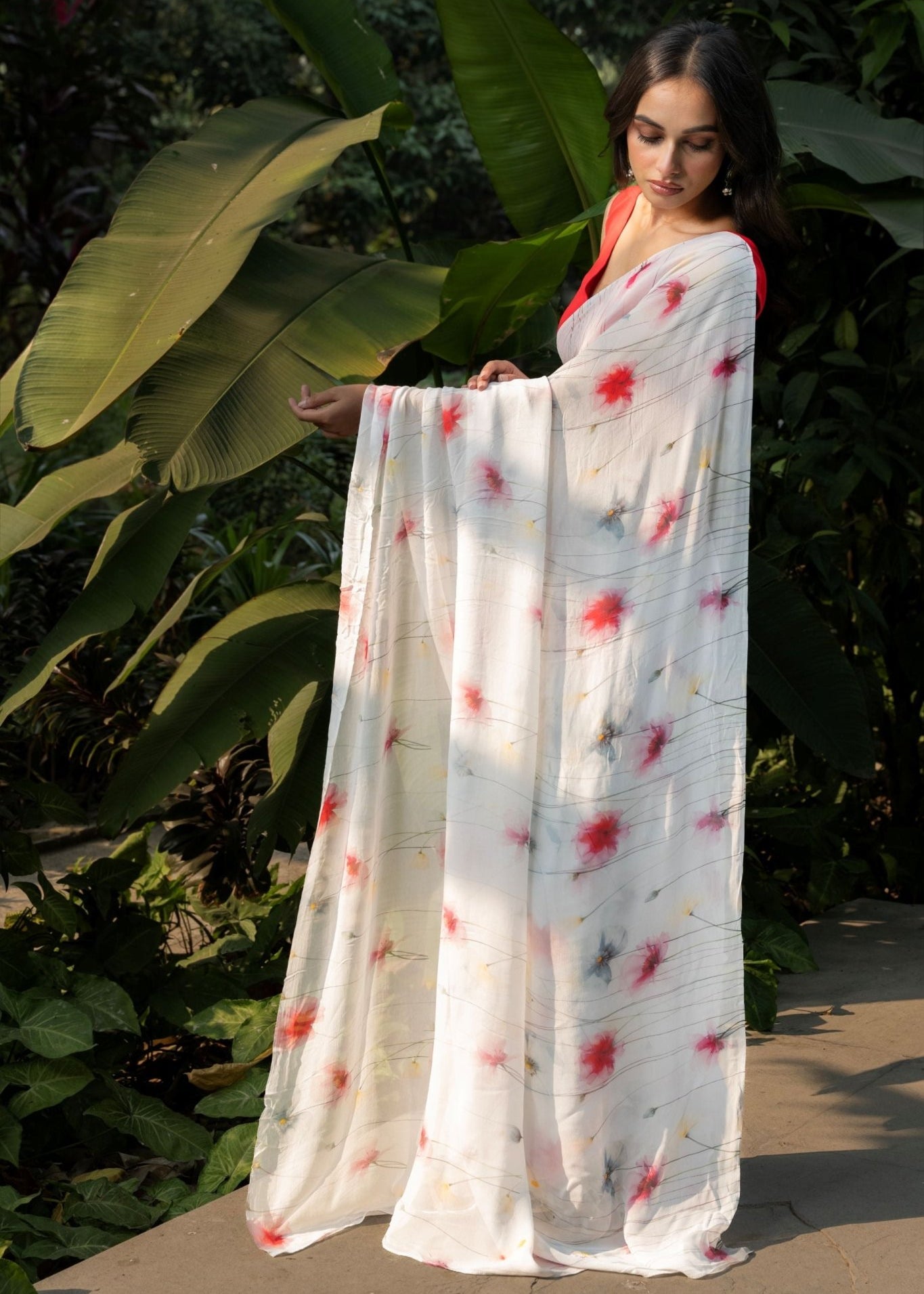 Pastel Blue Georgette Saree with Floral Prints - Anvi Couture