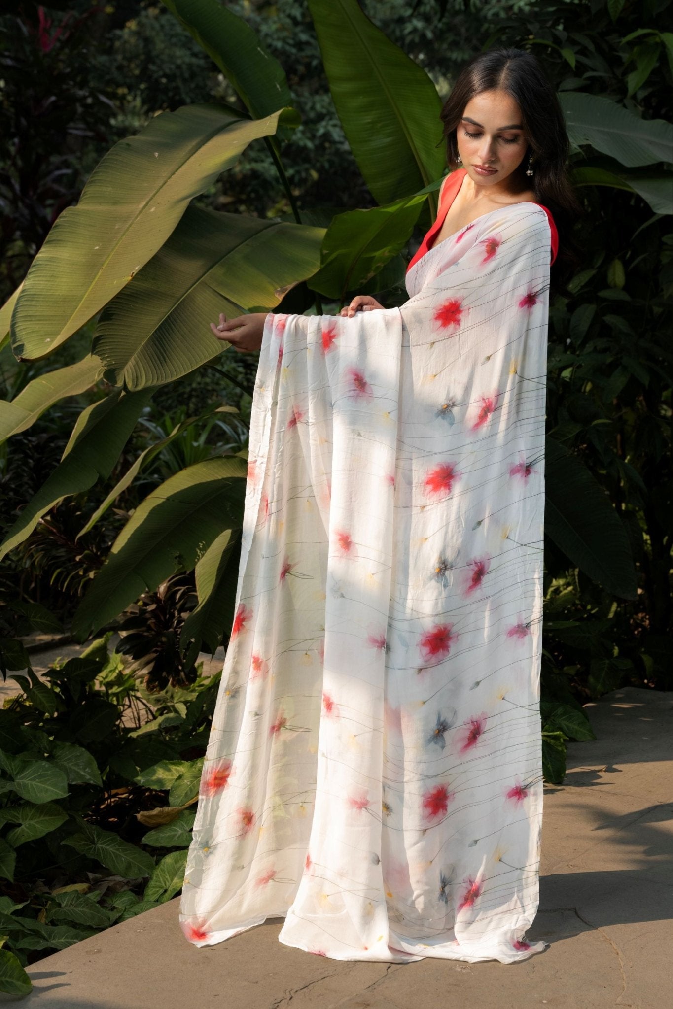 Pastel Blue Georgette Saree with Floral Prints - Anvi Couture