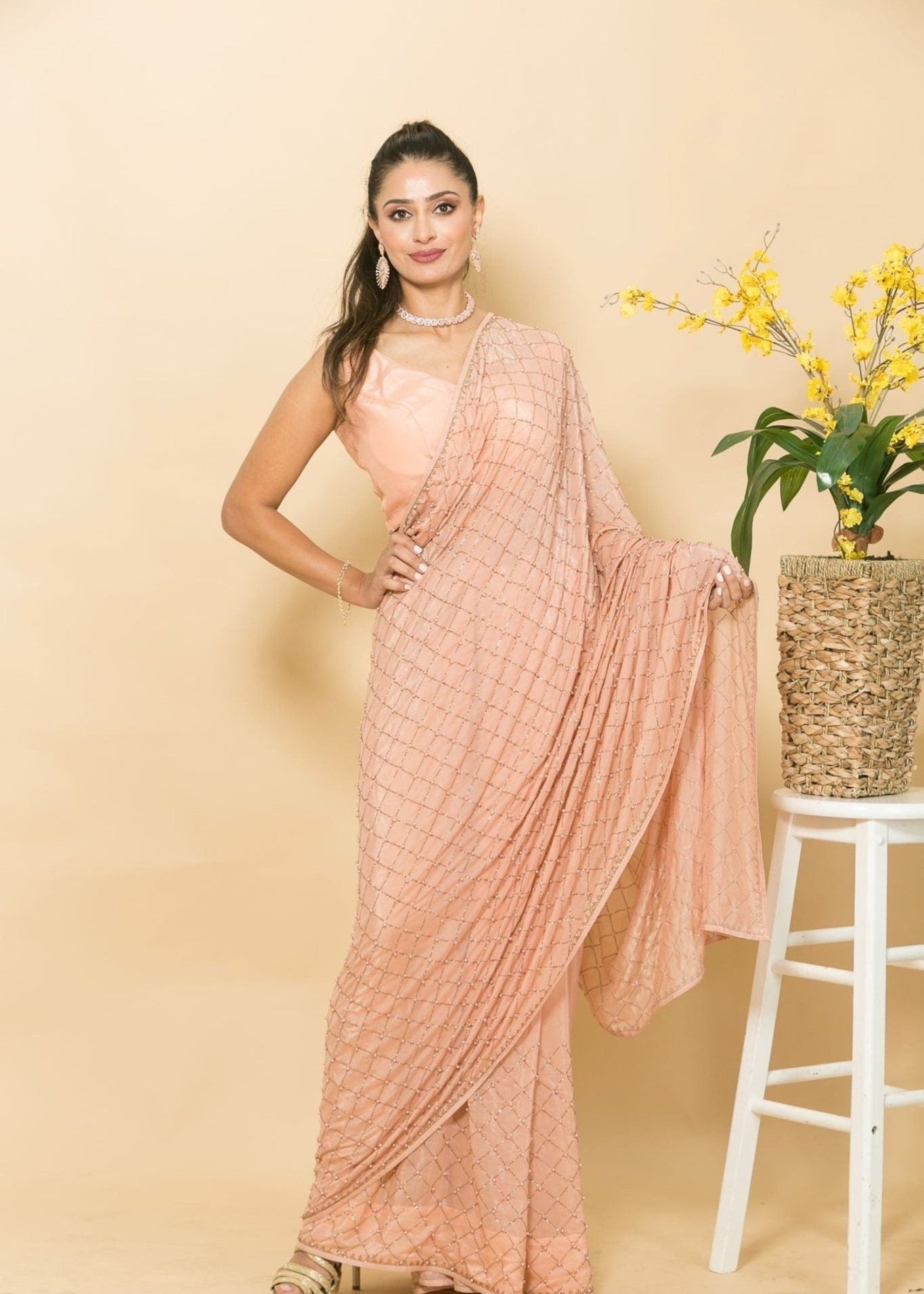 Peach Crepe Saree with Mukaish Embroidery and Small Pearl Design - Front
