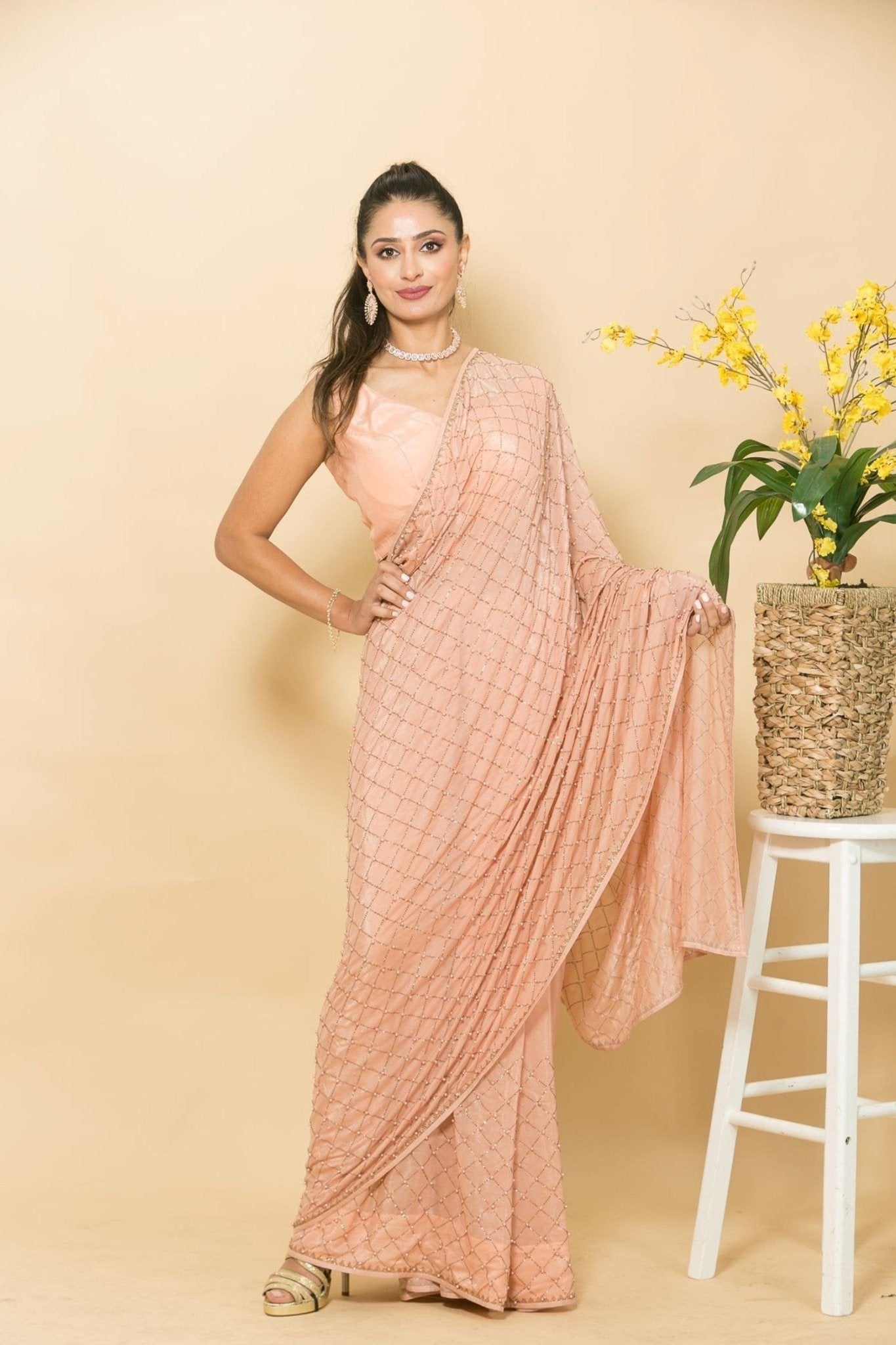 Peach Crepe Saree with Mukaish Embroidery and Small Pearl Design - Front
