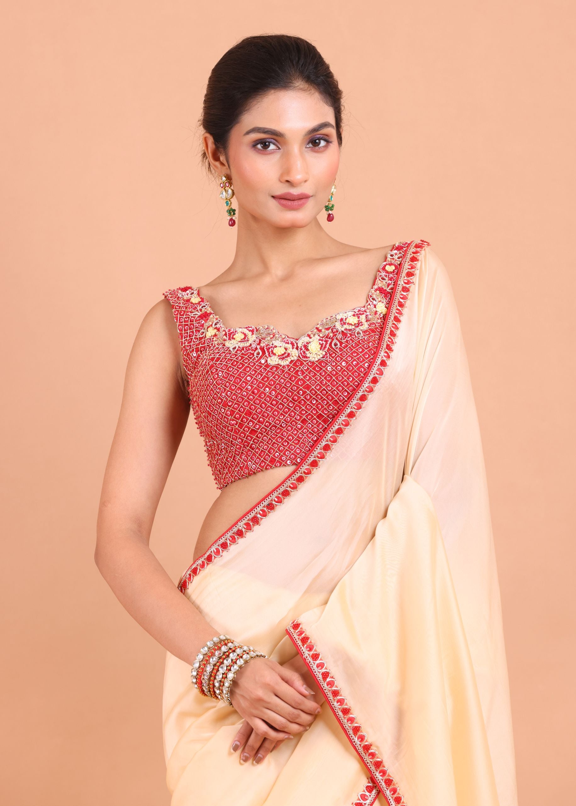 Peach Organza  Designer Saree with Hand Embroidered Border and Blouse close up
