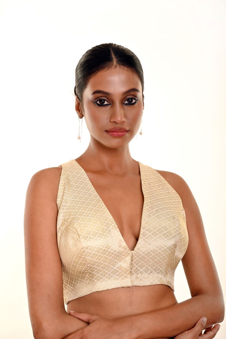 Pearl white silk brocade sleeveless blouse — front V-neckline view