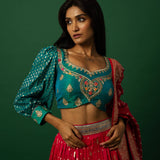 Pink Banarasi Weave Lehenga Set — Peacock Blue Choli embroidery close-up