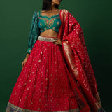 Pink Banarasi Weave Lehenga Set with Peacock Blue Choli — side view