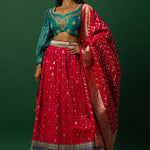 Pink Banarasi Weave Lehenga Set with Peacock Blue Choli — front view