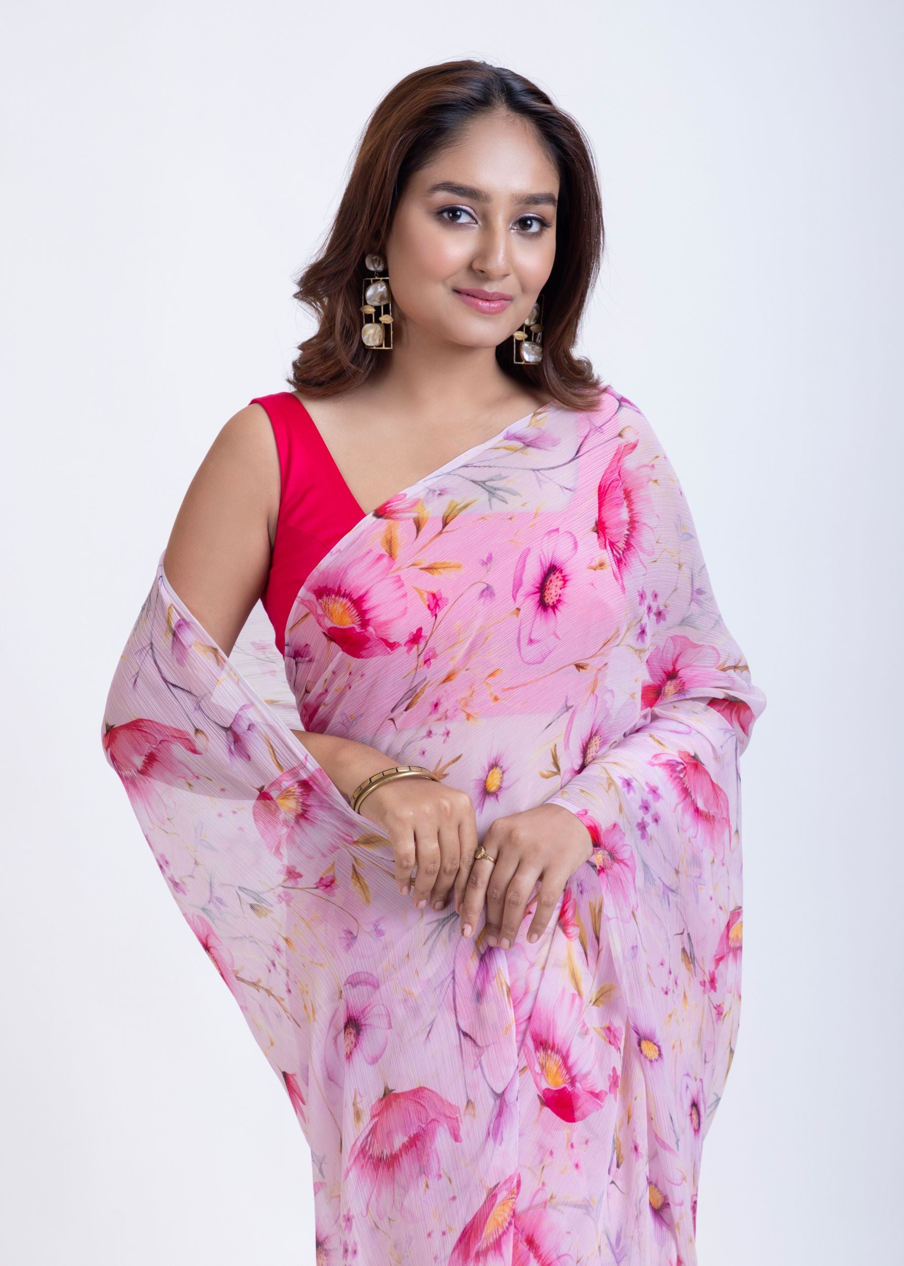Pink Chiffon Saree with Elegant Floral Prints Close Up
