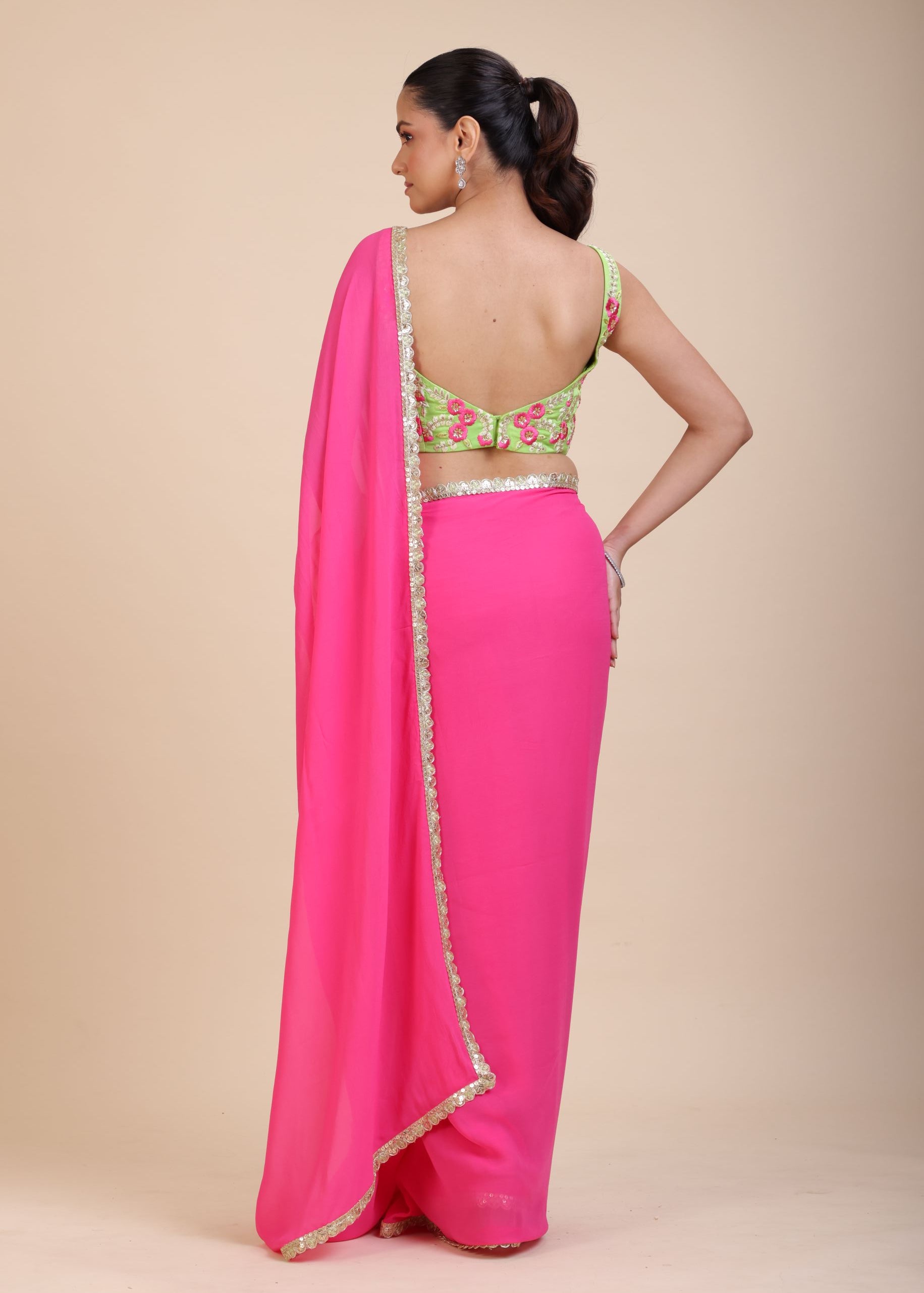 Pink Georgette Saree With Green Floral Embroidered Blouse Back
