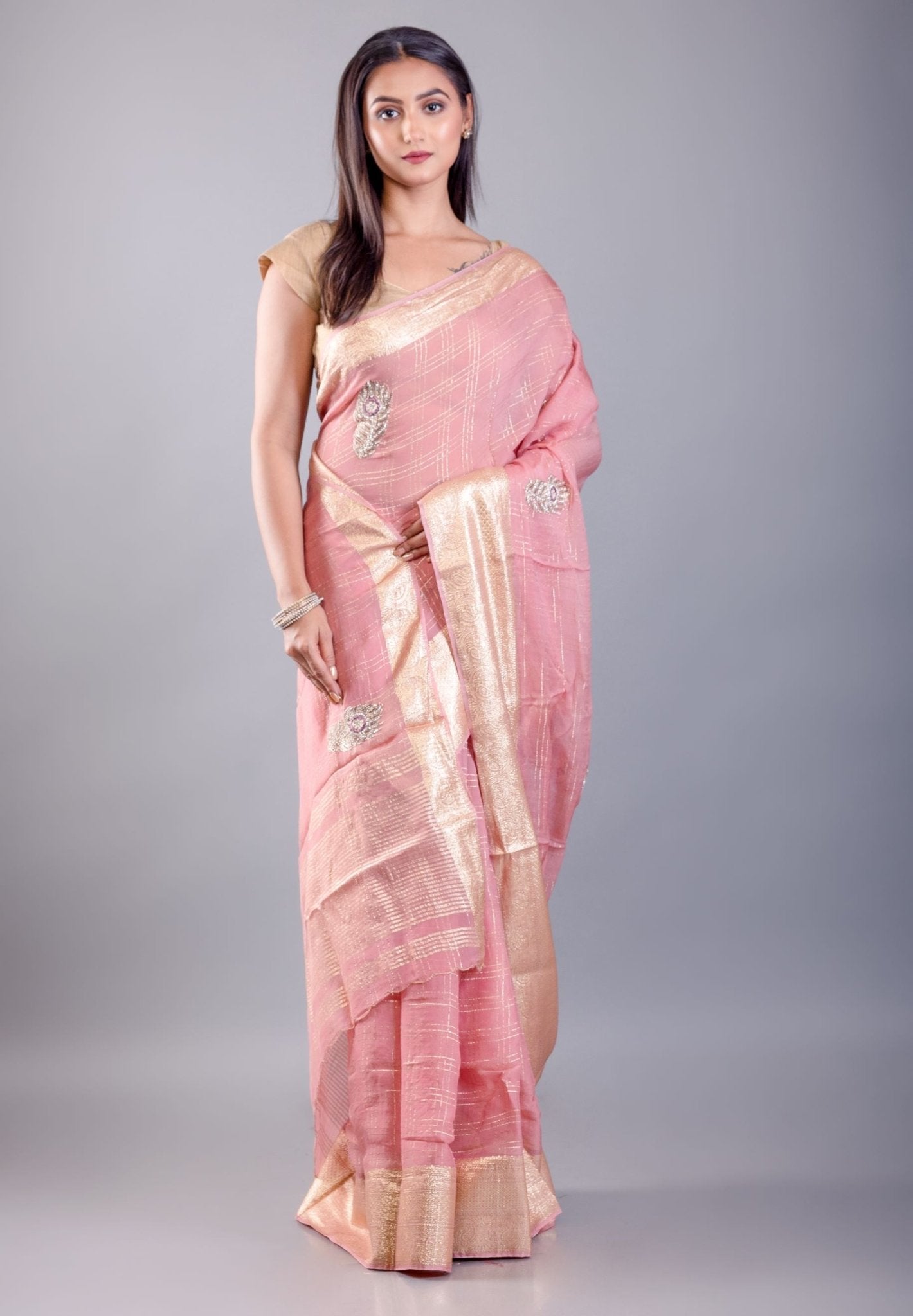 Pink Khaddi georgette saree — full-length pose showing embroidery detail