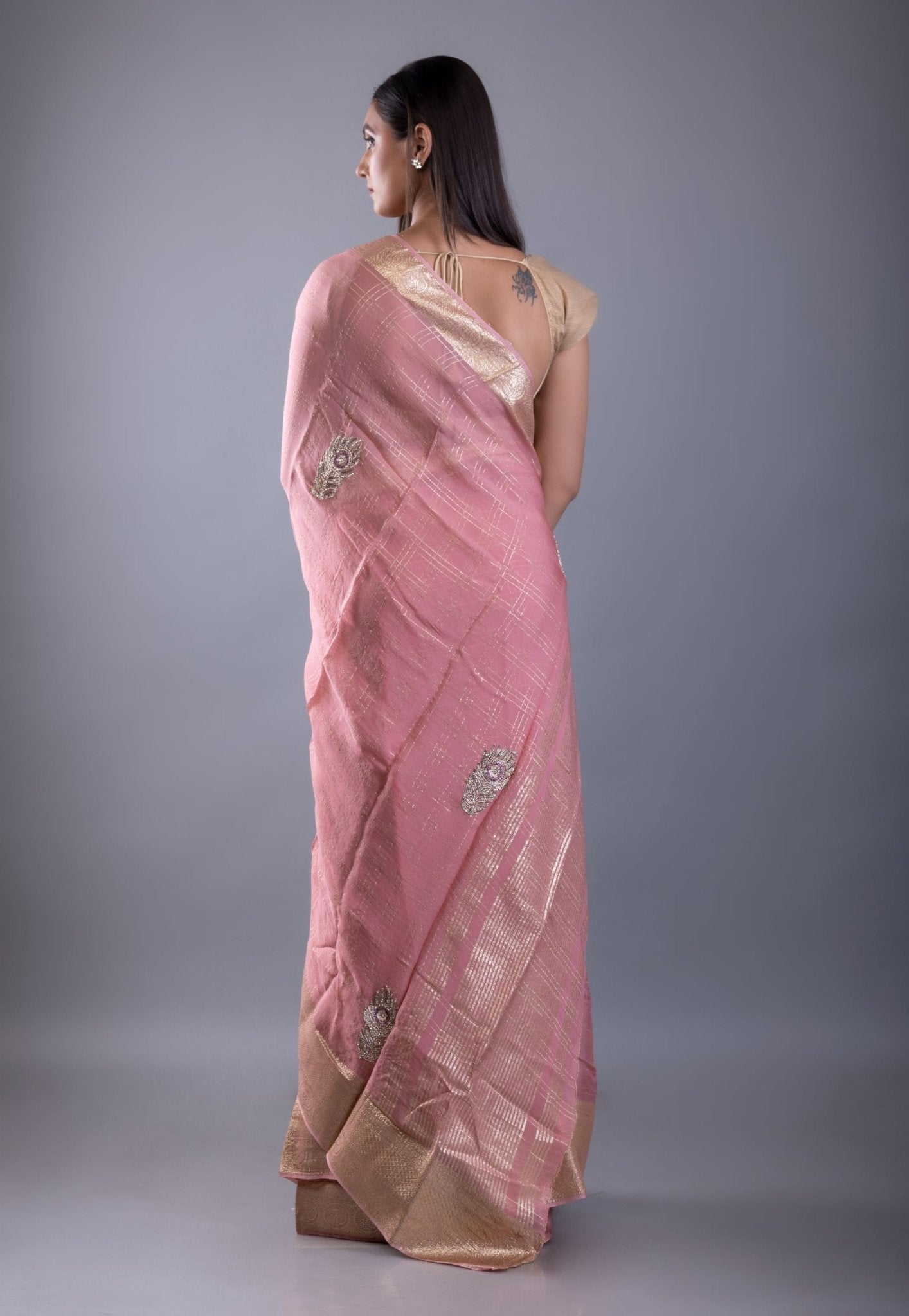 Pink Khaddi georgette saree with floral embroidered work — back view