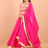 Pink and Gold Simple Lehenga Set With Brocade Choli flared lehenga view