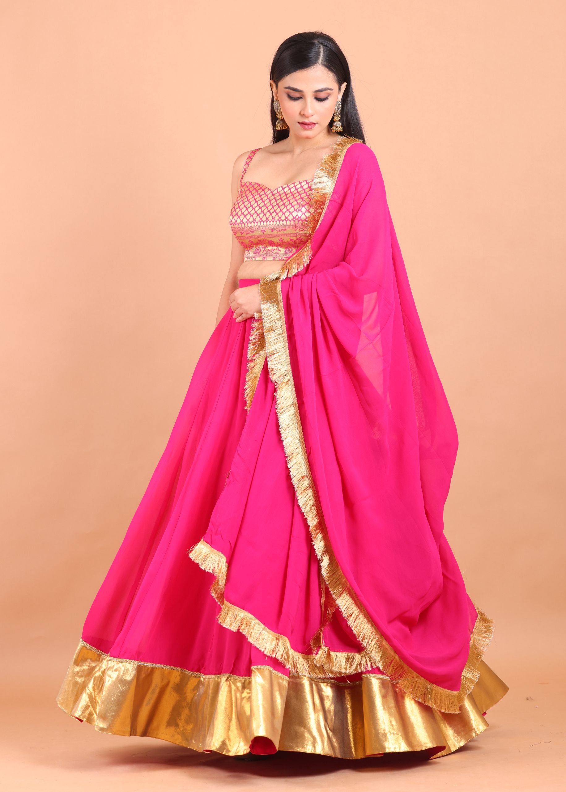 Pink and Gold Simple Lehenga Set With Brocade Choli flared lehenga view