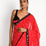Pink and black printed georgette saree — front view with plunging neck pleated designer blouse - Front 5