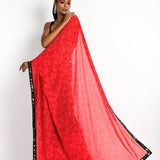 Pink and black printed georgette saree — front view with plunging neck pleated designer blouse - Front 2