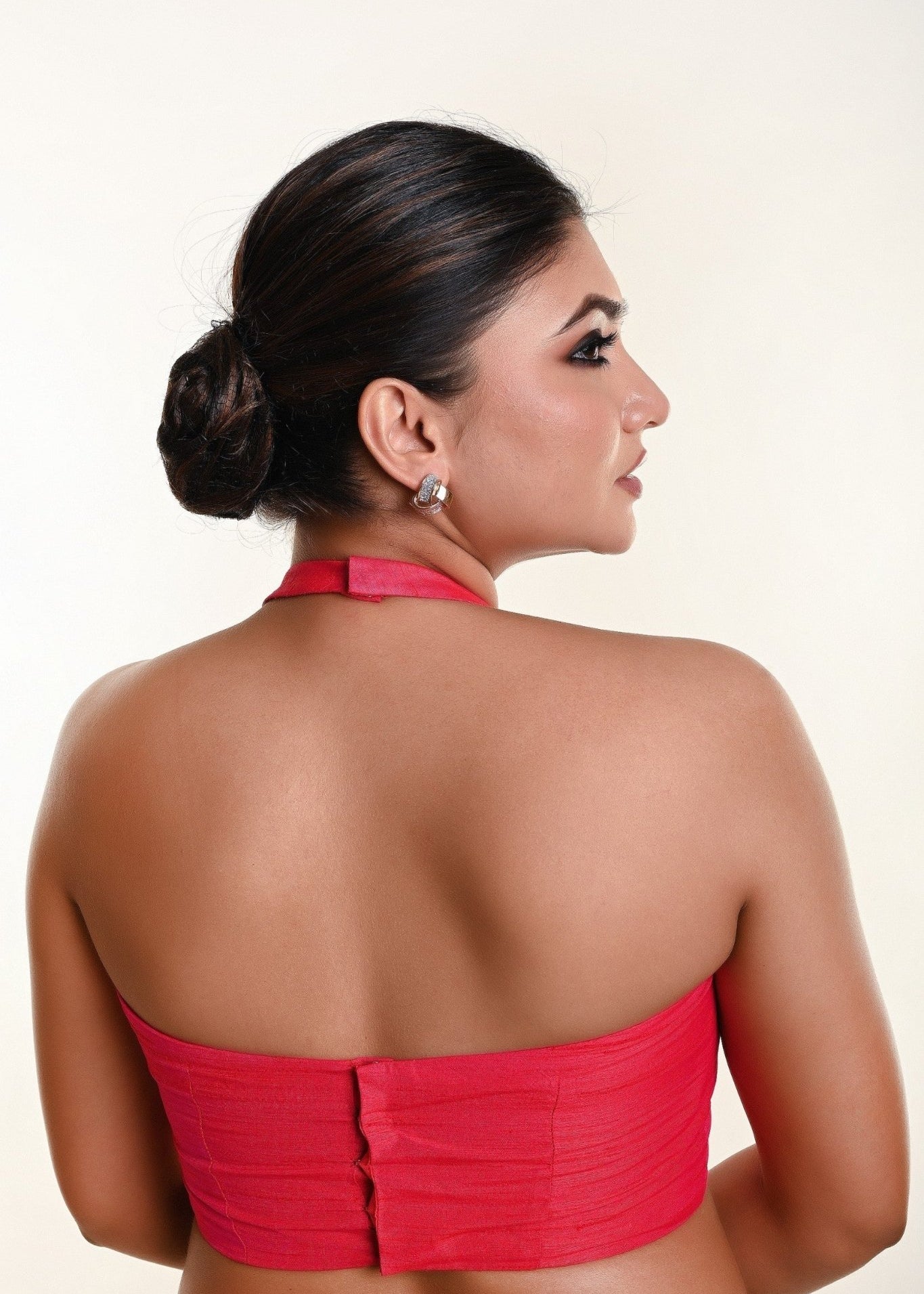 Pink cotton silk halter neck blouse with deep plunging neckline — back view