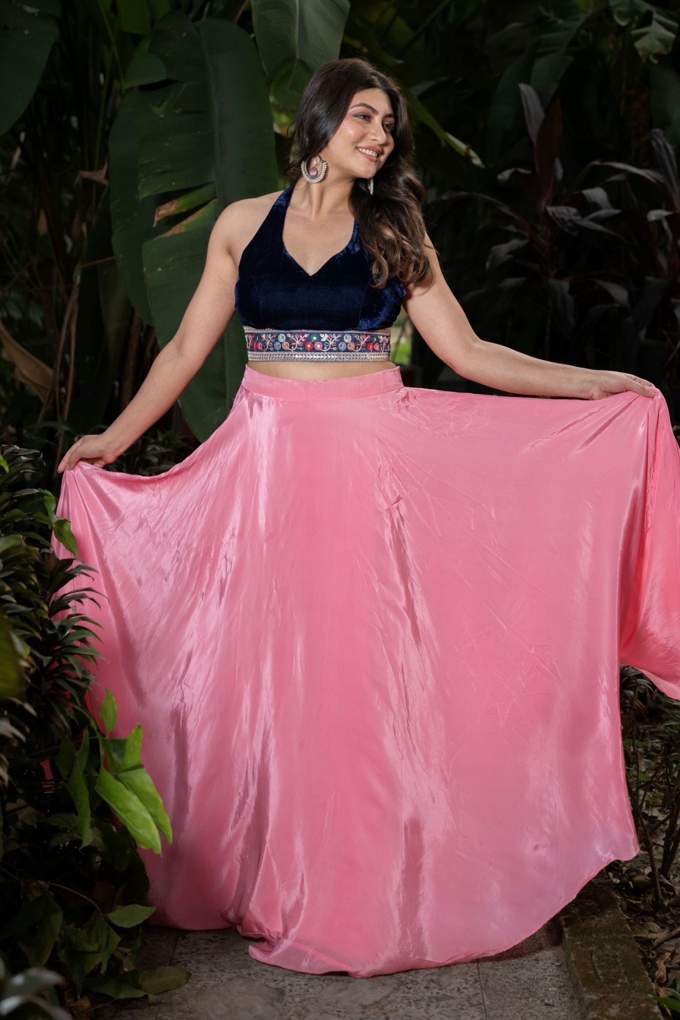 Pink lehenga set — close-up of blue velvet embroidered crop top neckline and sleeve detail - Front 2