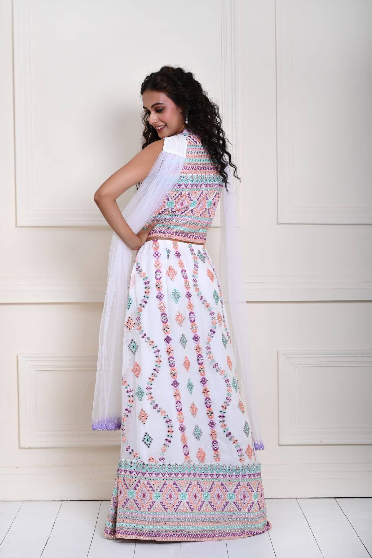 Pure White Georgette Lehenga Set with Multicolor Embroidered Mirror Work - Back side