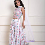 Pure White Georgette Lehenga — close-up of multicolor embroidered mirror work on skirt