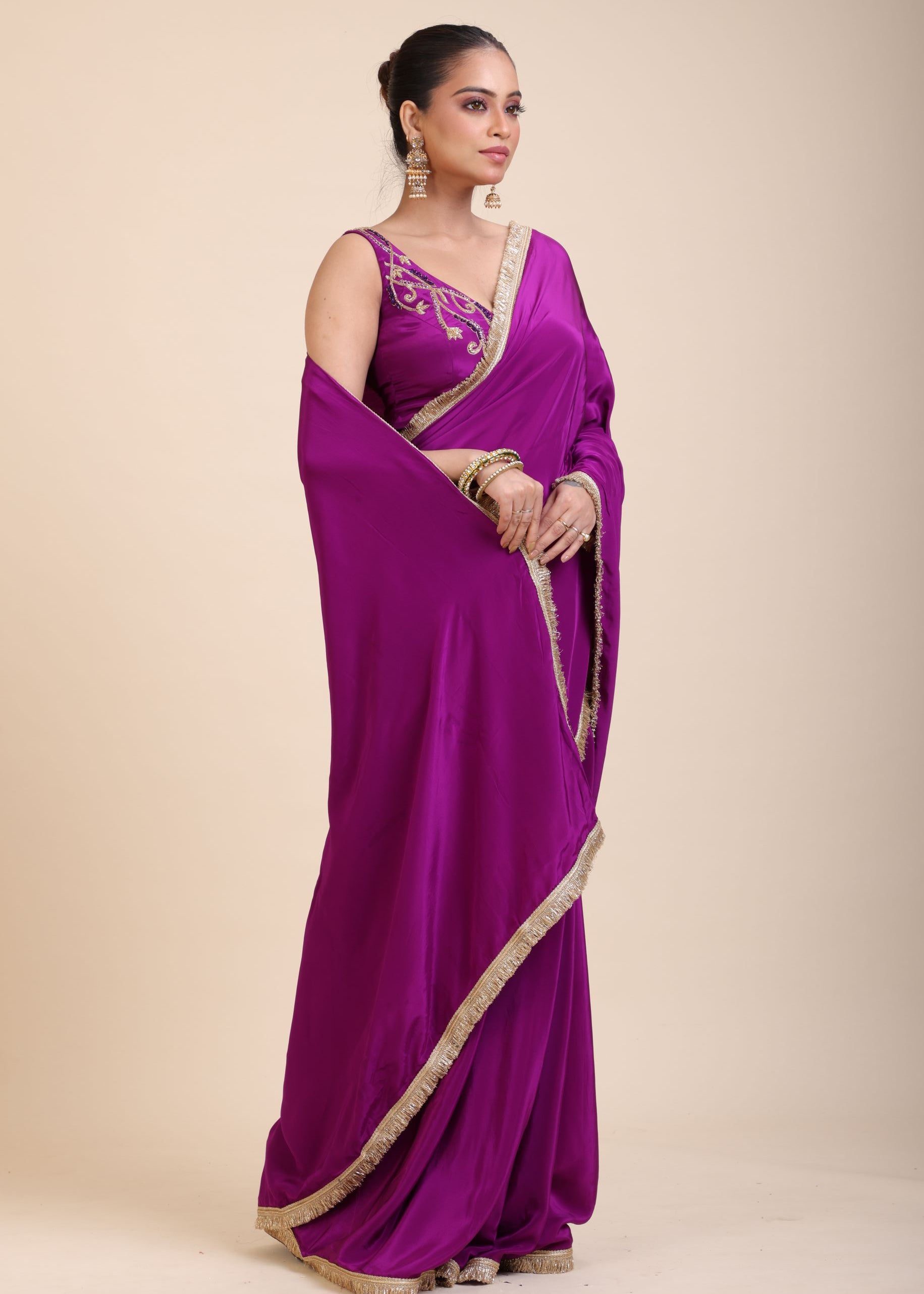 Purple and Gold Crepe Silk Saree with Gold Embroidered Lace front