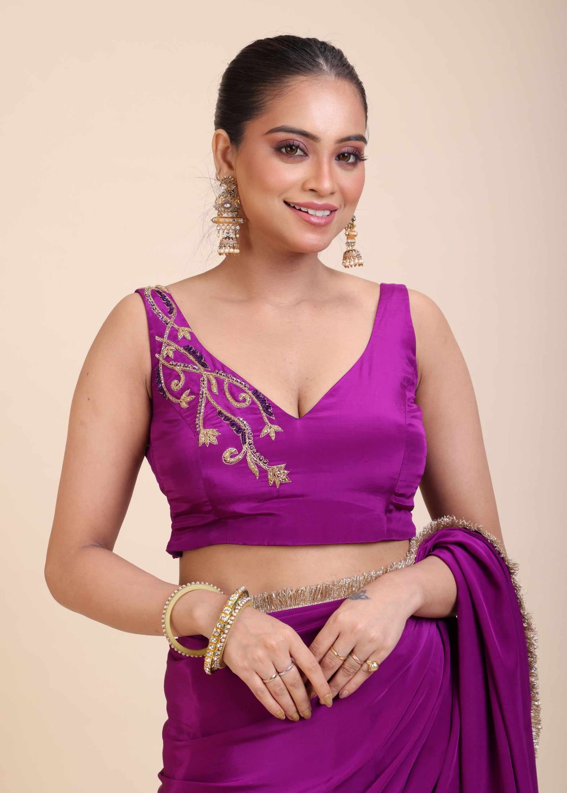 Purple and Gold Crepe Silk Saree with Gold Embroidered Lace close up