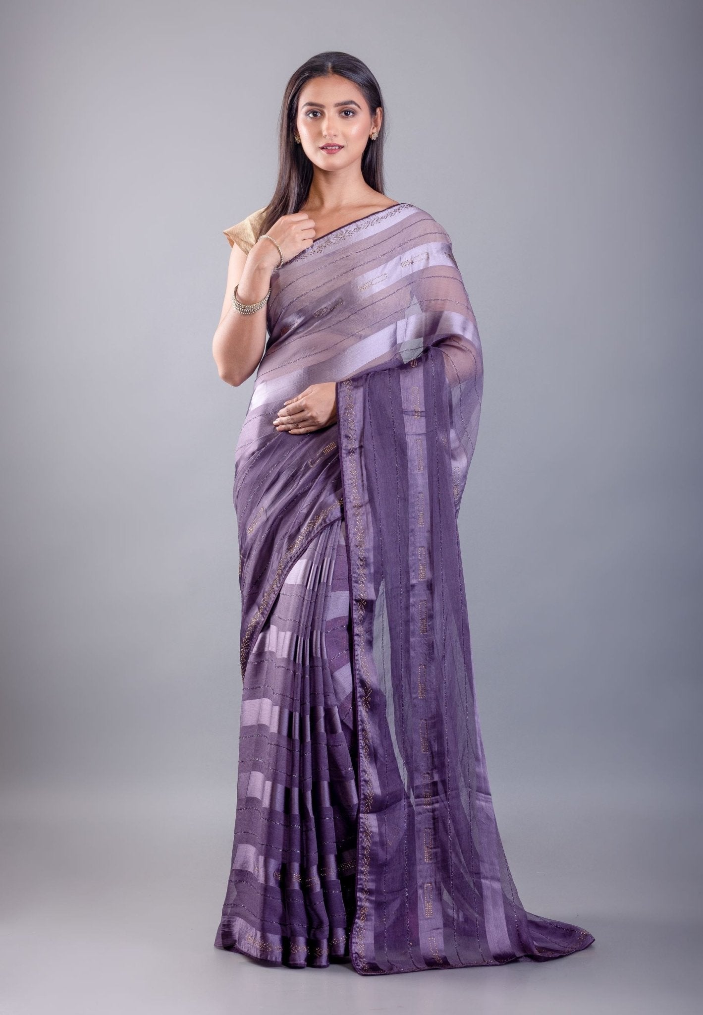 Purple ombre georgette saree with self stripe — front drape on model
