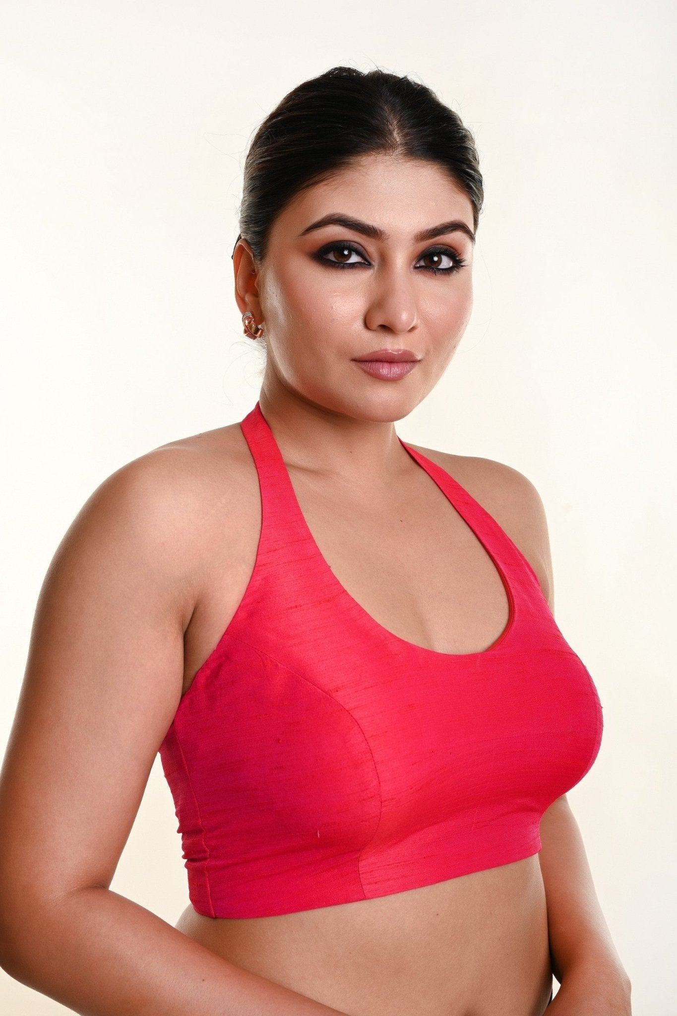 Rani pink halter neck blouse — side profile view showing neckline depth