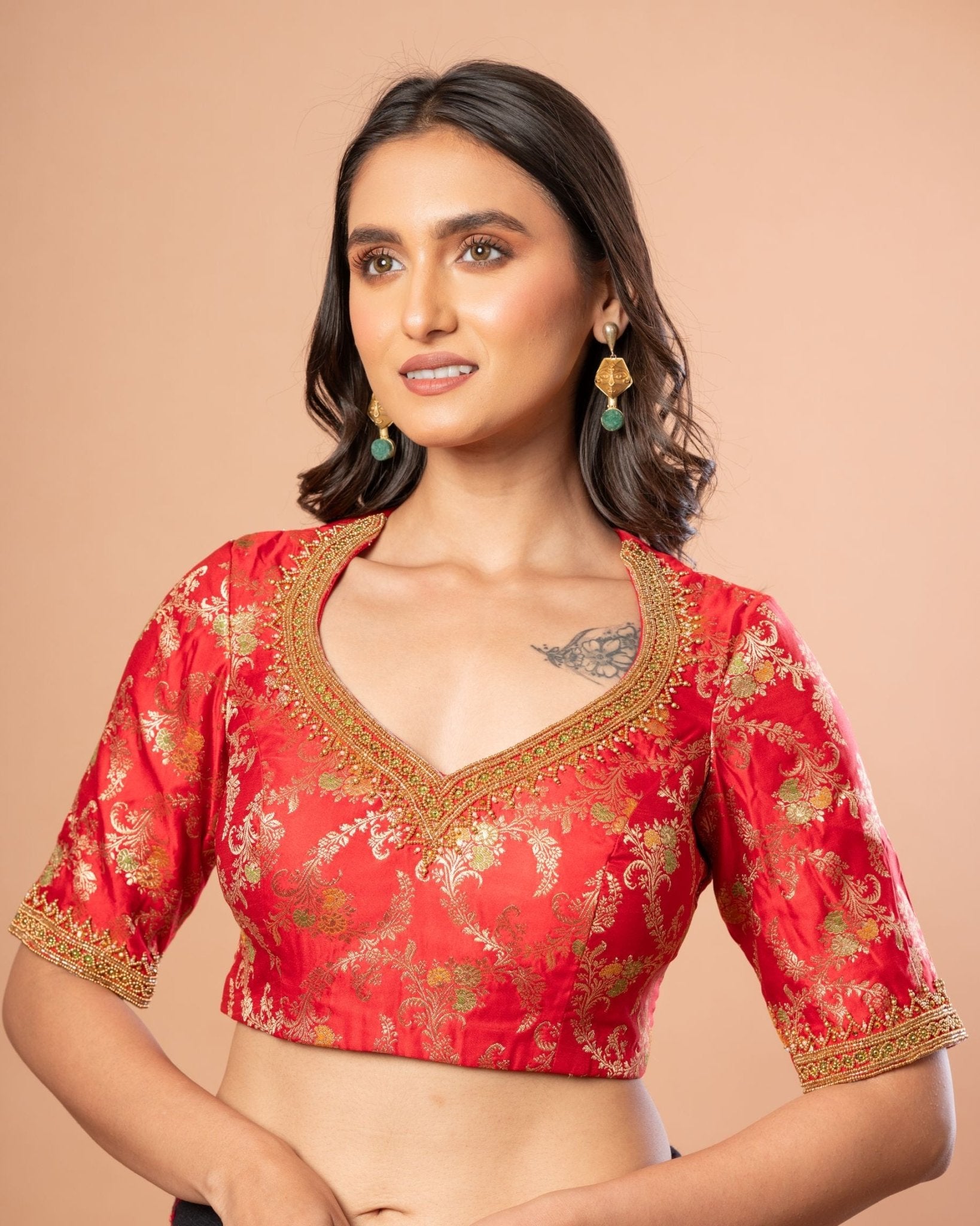 Red Banarasi brocade blouse — full length view showing sleeve and hem