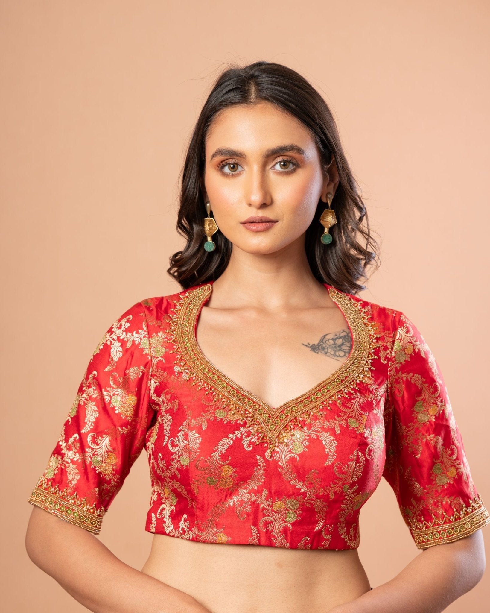 Red Banarasi brocade bridal blouse — front view with aari hand embroidery