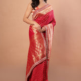 Red Banarsi Wedding Saree With All over Zari work and Embroidered Lace Border - Anvi Couture - front 3