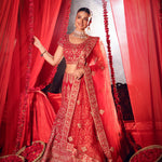 Red Bridal Lehenga Set standing