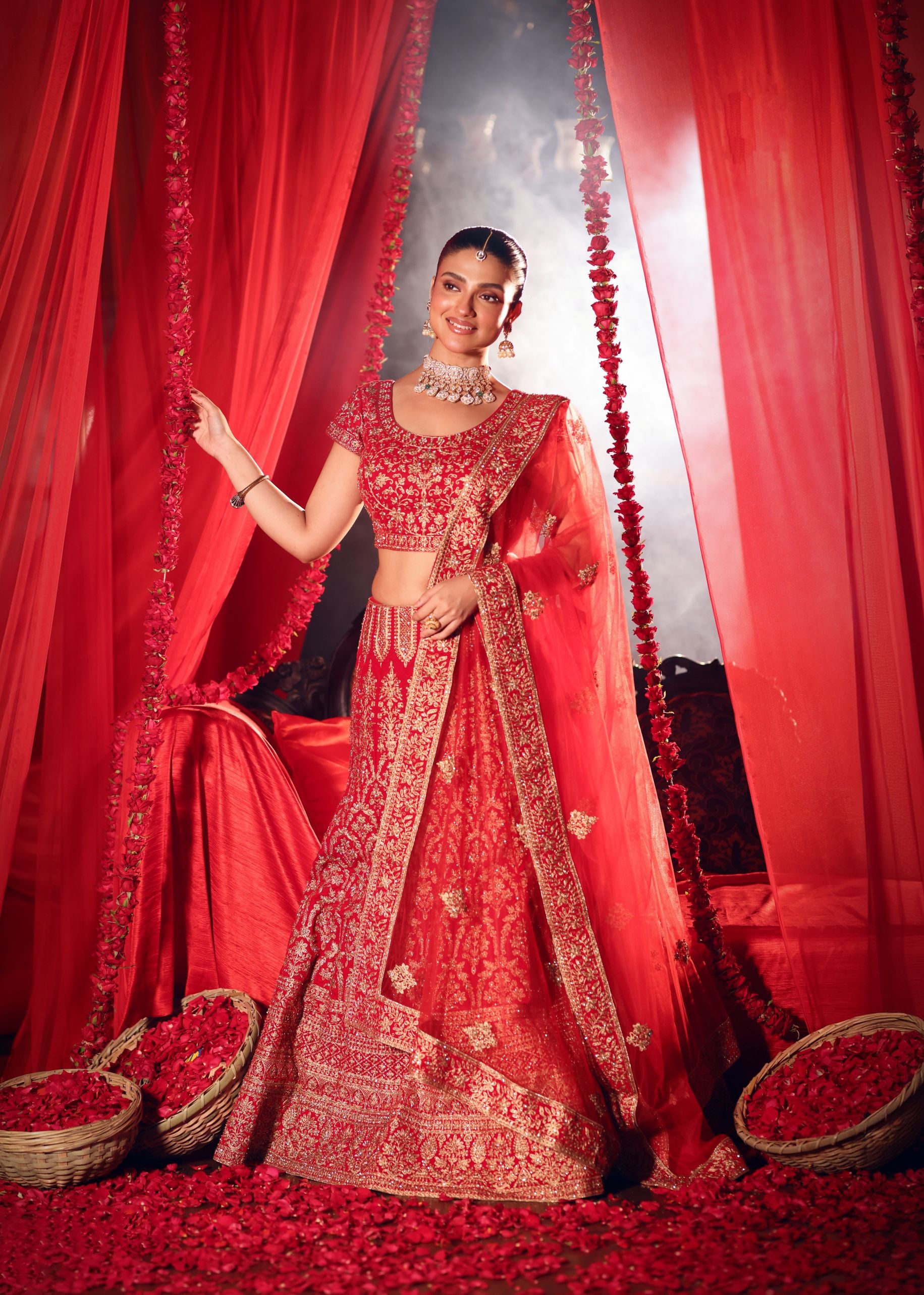 Red Bridal Lehenga Set standing