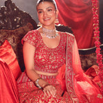 Red Bridal Lehenga Set sitting