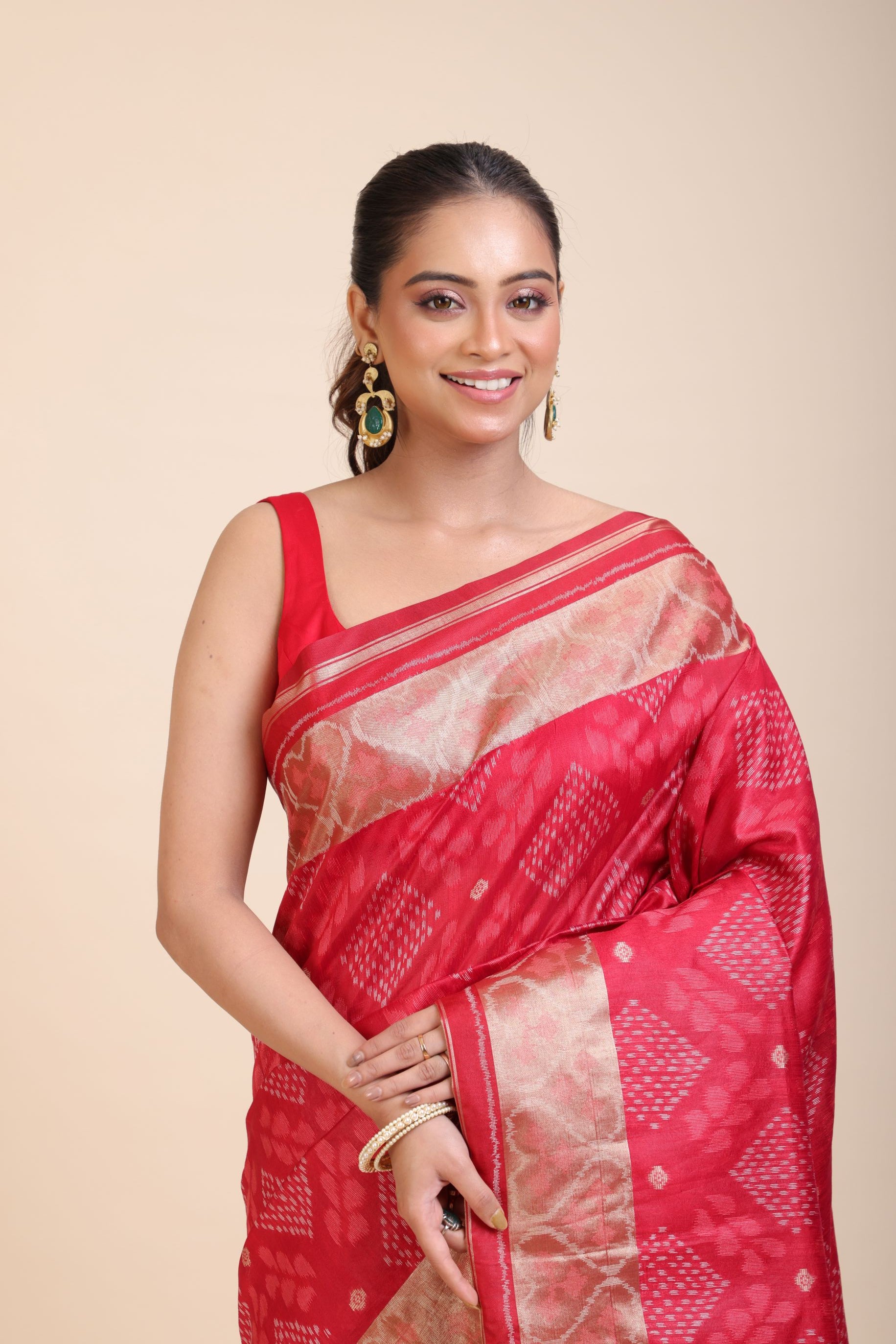 Red Patola Saree With Golden Border close up