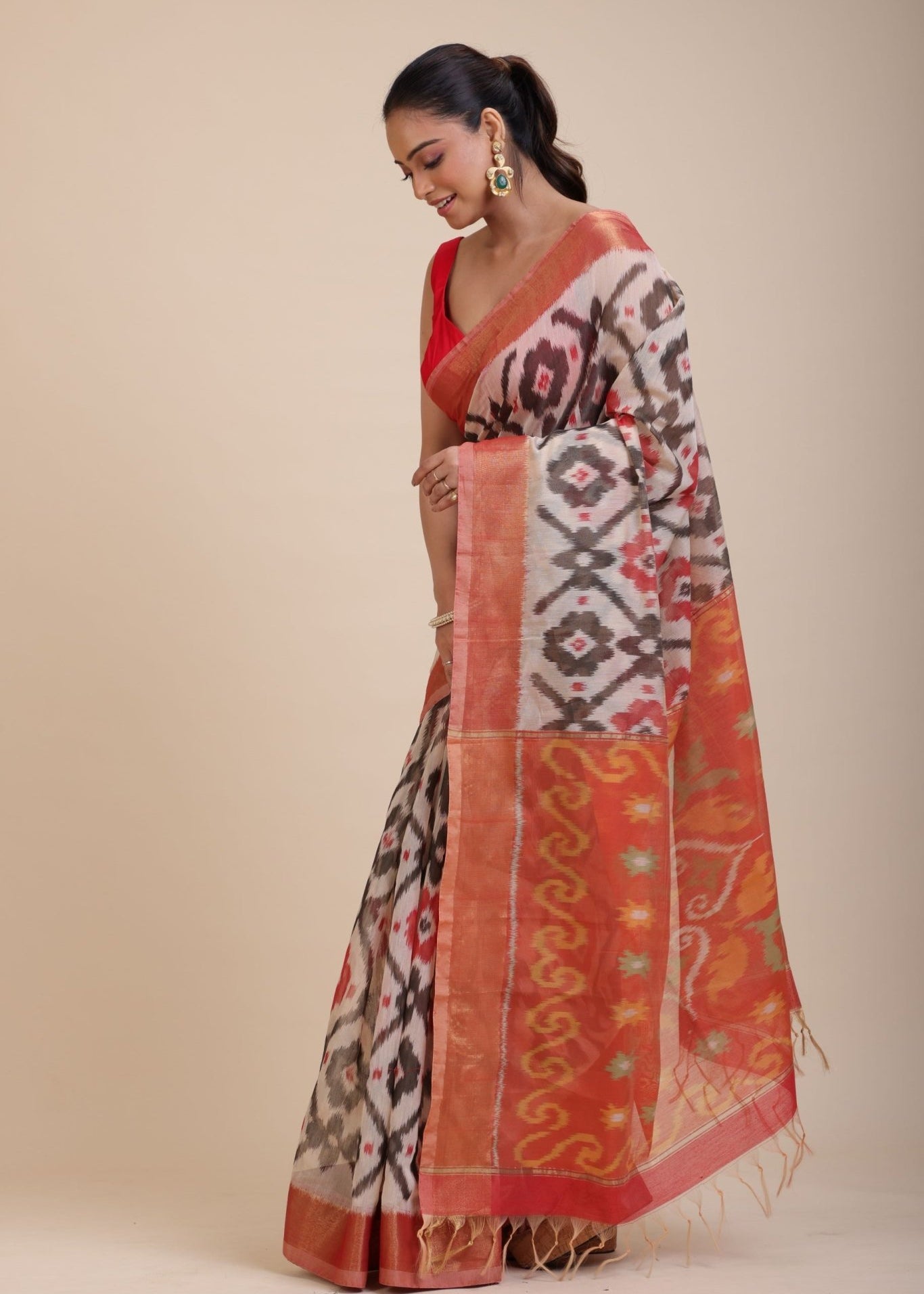 Red and White Ikkat Silk Saree with Black Woven - Anvi Couture