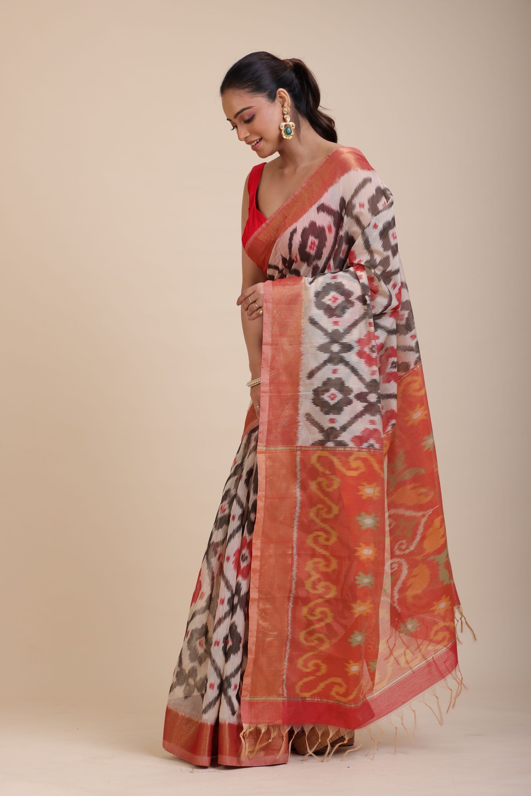Red and White Ikkat Silk Saree with Black Woven front