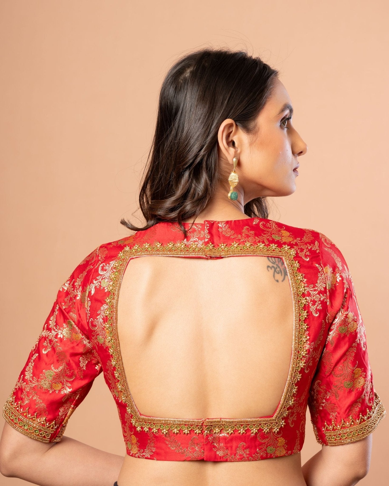 Red bridal blouse — back neck design with hand embroidered aari work