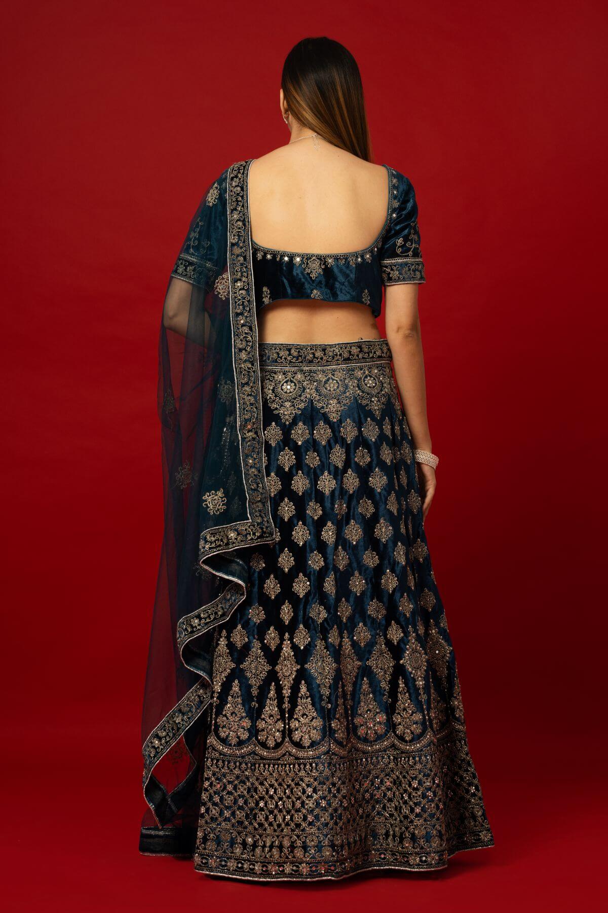 Designer Bridal Lehenga in Blue Velvet with Zardozi Handwork