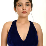 Royal blue velvet halter neck saree blouse with plunging neckline — front view — Anvi Couture