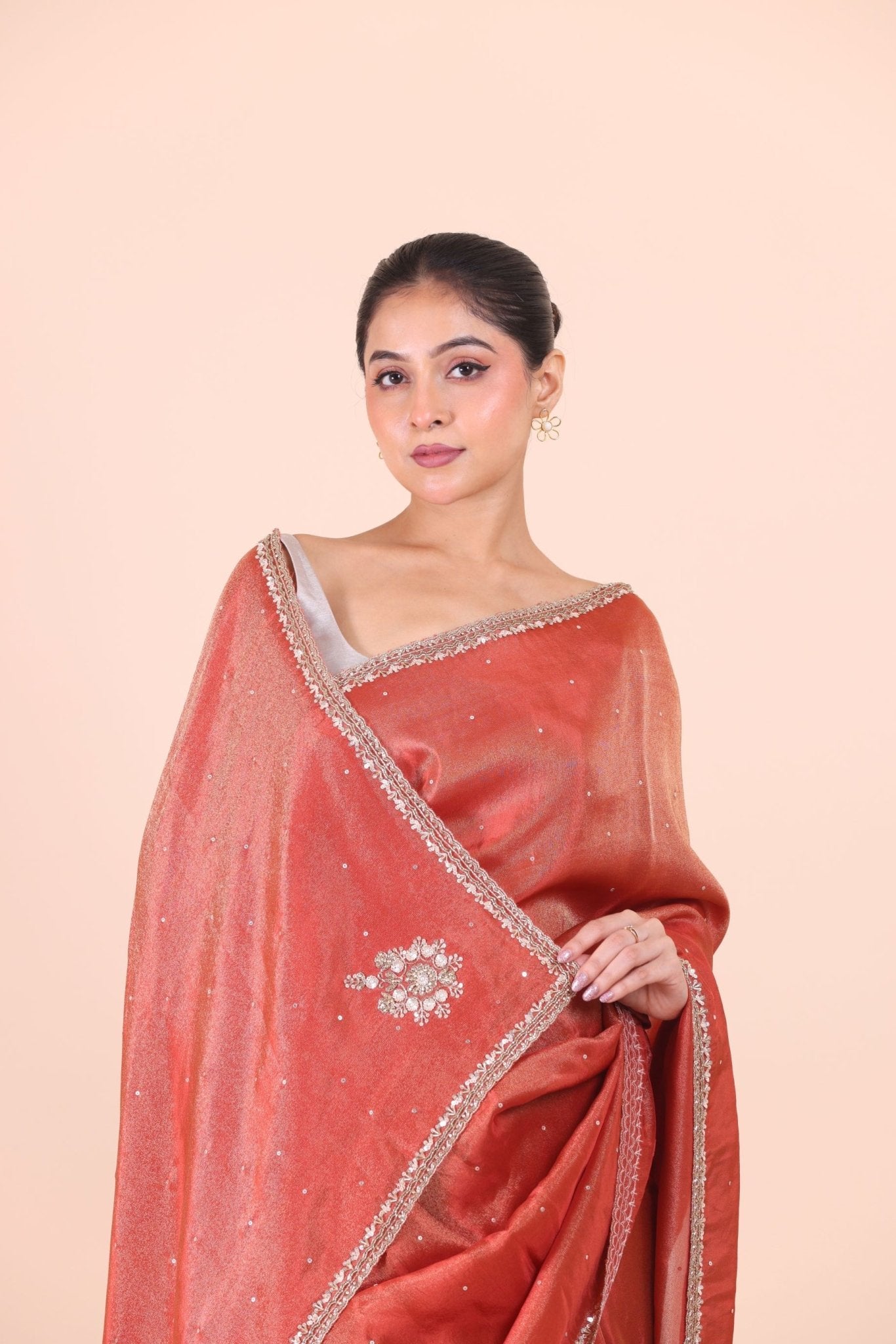 Rust Orange Tissue Saree With Embroidered Border close up